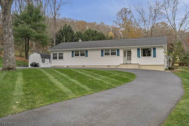 Bright and airy ranch features natural light, hardwood floors