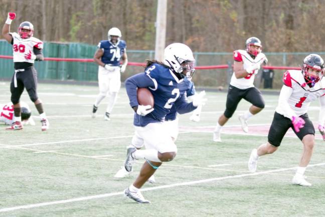 SCCC defeats Erie, 55-6 Sussex running back Jaiden Murphy carries the ball.