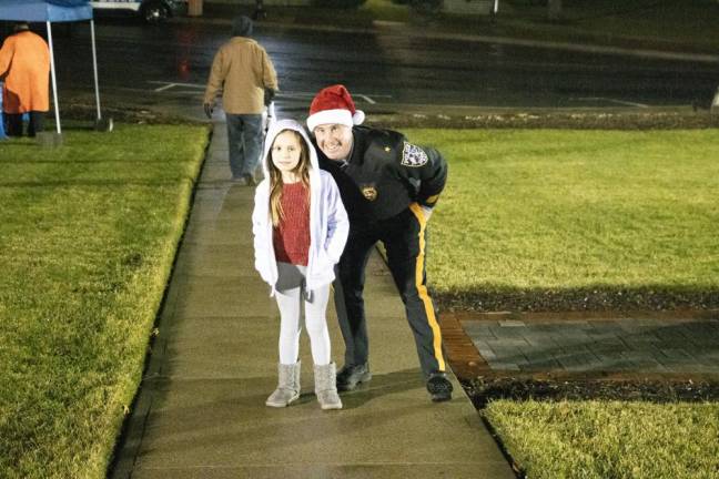 Police Chief Jeffery McCarrick poses with his daugher Piper, 8.