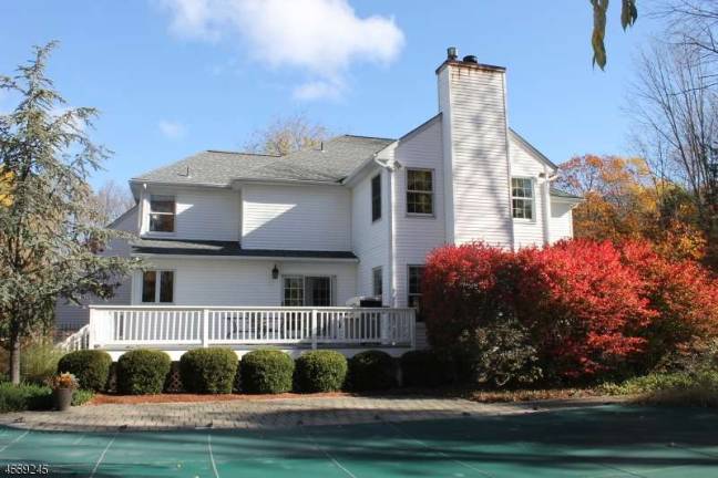Four-bedroom Colonial in lovely setting Four-bedroom Colonial in lovely setting