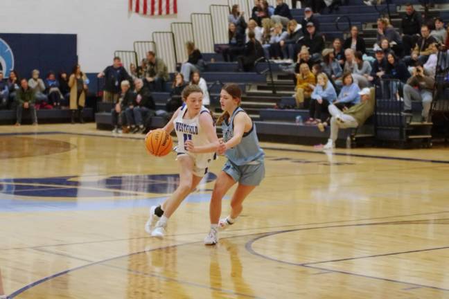 Westfield's Andie Janota handles the ball while covered by Sparta's Alyssa Ciaburri late in the second half.