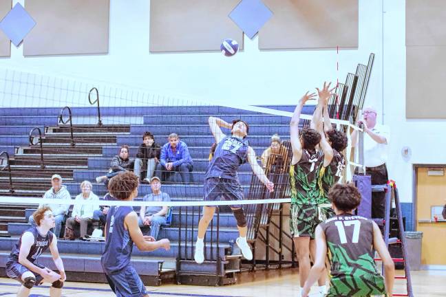 Sports roundup: Pope John wins H/W/S title Sparta's Joshua Tolentino (27) leaps toward the ball in the game against J.P. Stevens on Friday, May 9. The Spartans lost, 2-0.