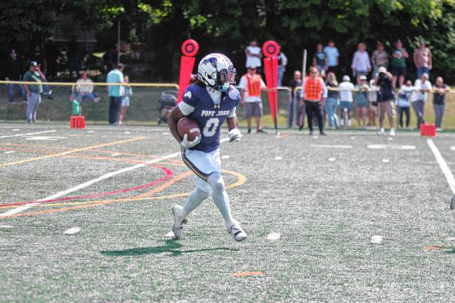 Football roundup: High Point beats Jefferson <b>Pope John kick returner Prince Joshua is on the move. (Photo by George Leroy Hunter)</b>