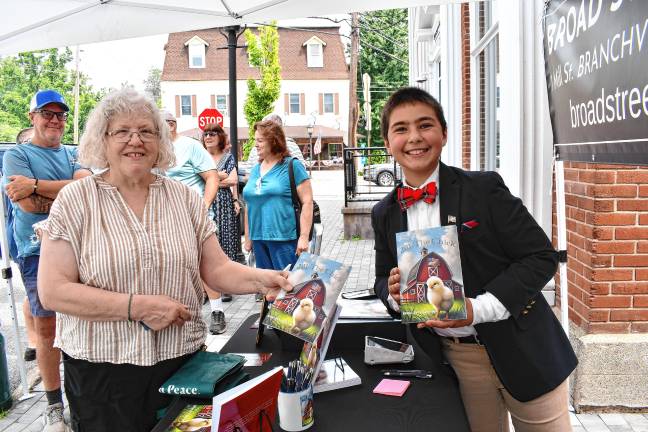 Young author’s book deals with big themes Chris Higgins of Montague with Zy Saturnees.