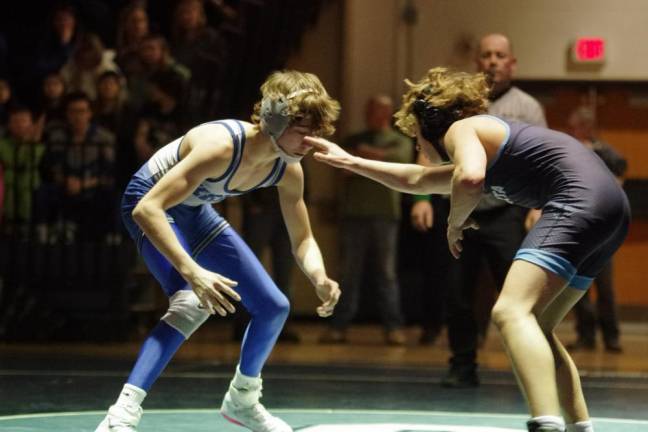 Kittatinny’s Troy Sharp, left, faces Sparta’s Johnathan Petelicki in the 106-pound weight class. Sharp pinned Petelicki in 3:27.