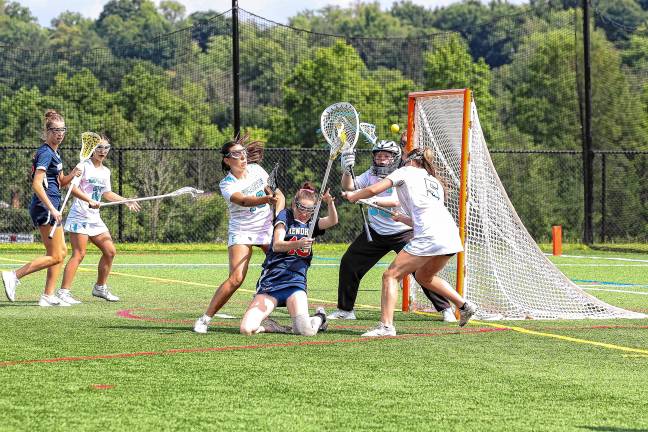Photos: Spartans in Group 2 final Mendham battles through a tight Sparta defense to fire off a shot in the first half of the sectional final.