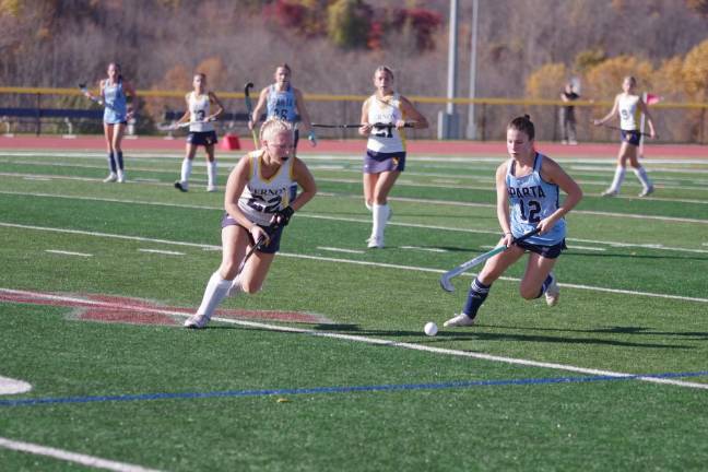 Taryn Picariello of Vernon and Eliana Intorrella of Sparta close in on the ball in the opening round of the NJSIAA North Jersey, Group 2 tournament Oct. 27 in Vernon. The third-seeded Vikings defeated 14th-seeded Sparta, 5-1. (Photos by George Leroy Hunter)