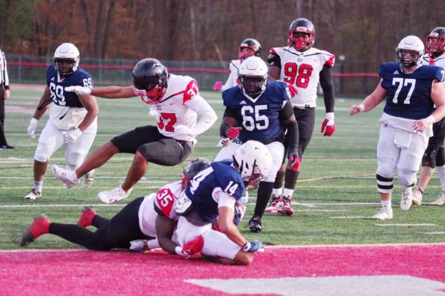 SCCC defeats Erie, 55-6 Sussex Skylanders wide receiver Jawon Foushee (14) lands inside the end zone for a touchdown in the fourth quarter of the game against the Erie Kats on Saturday, Nov. 4. (Photos by George Leroy Hunter)