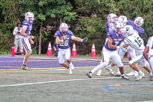 Football roundup: High Point beats Jefferson <b>Pope John running back Luke Gialanella carries the ball in the season opener against DePaul on Saturday, Aug. 30. DePaul won, 31-3. (Photo by George Leroy Hunter)</b>