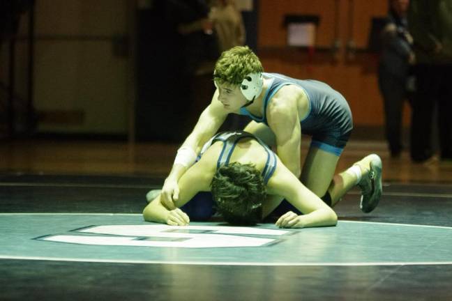 Sparta’s Logan Hrenenko handles Kittatinny’s Leonardo Garcia in the 138-pound weight class. Hrenenko won by technical fall (20-4) in 4:15.