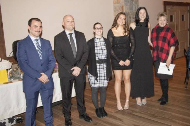 From left are Sparta Ambulance Squad Capt. Max Merlino, 1st Lt. Benjamin Wright, 2nd Lt. Alexandra Castiglia, Sgt. Aubrey Coombs, trustee Allyson Wright and Councilwoman Christine Quinn. Trustee Bradley Erickson was unable to attend the dinner.