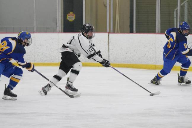 Kinnelon/Jefferson/Sparta United’s Michael Pandiscia steers the puck.