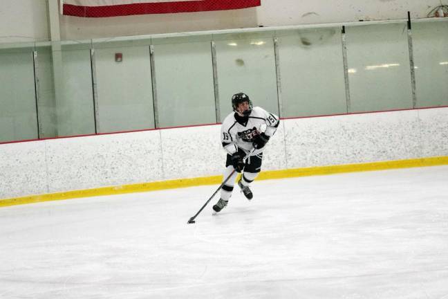 Kinnelon/Jefferson/Sparta United’s Alex Roslan controls the puck.