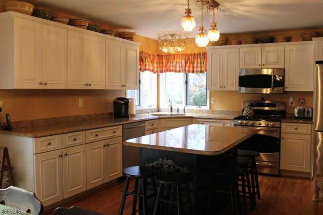Four-bedroom Colonial in lovely setting Four-bedroom Colonial in lovely setting