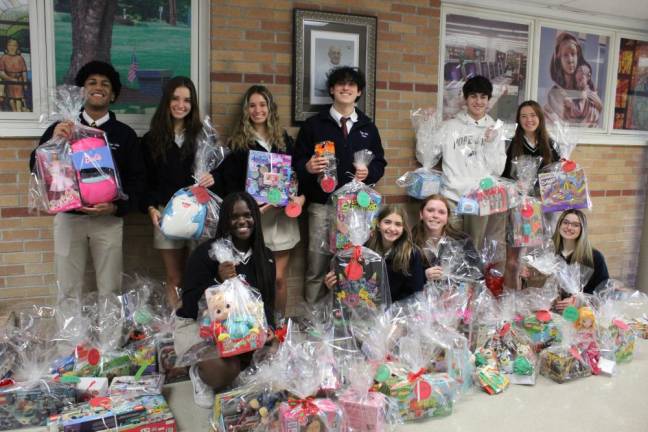 Bringing cheer to children Pope John XXIII Regional High School students and faculty donate more than 100 toys to patients at Goryeb Children’s Hospital in Morristown. (Photos provided)