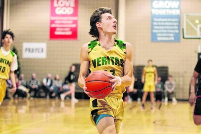 Veritas forward Nicholas Jetton scored eight points and grabbed 10 rebounds. (Photo by George Leroy Hunter)