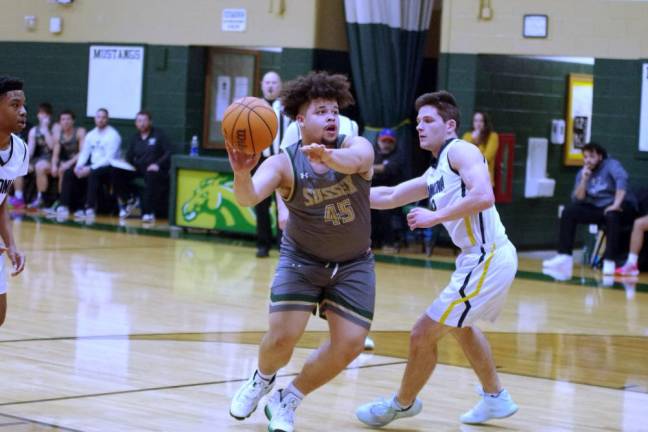 Sussex Tech's Jeremiah Fontanez handles the ball. He scored 10 points, grabbed four rebounds and made one steal.