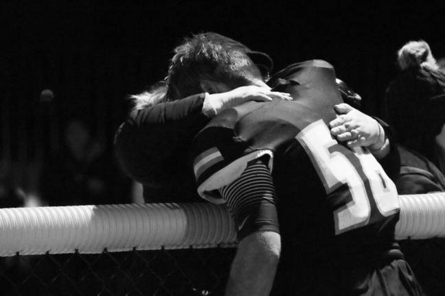 A heartfelt, consoling hug from mom at game's end.