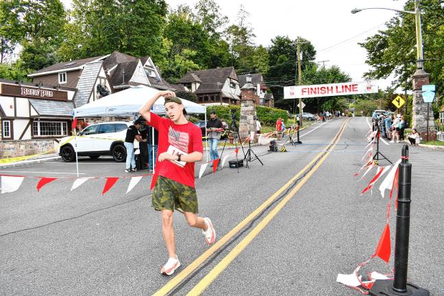 Photos: Labor Day 5K in Sparta Jack McGurrin, 17, of Sparta wins the Labor Day 5K with a time of 17:04.29.