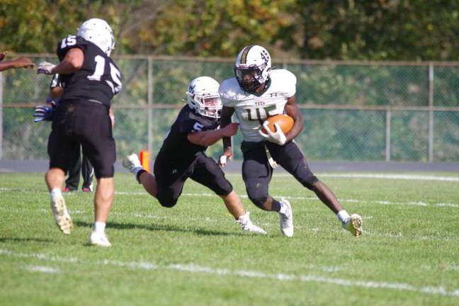 Sussex County Tech running back Josiah O'Conner is on the move with the ball in the fourth quarter.