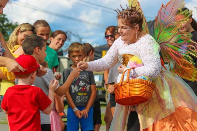 A magical moment for children at the State Fair with Ella the Fairy Queen who enjoys professional costume designing. The best part? I love seeing children's eye light up when the see a fairy.