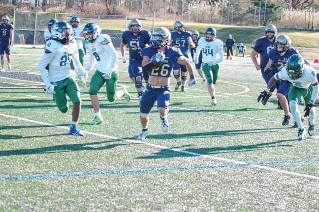 High Point defeated in sectional semifinal <b>Pope John running back Luke Gialanella carries the ball in the open field. He made two touchdowns and rushed for 89 yards. (Photo by George Leroy Hunter)</b>