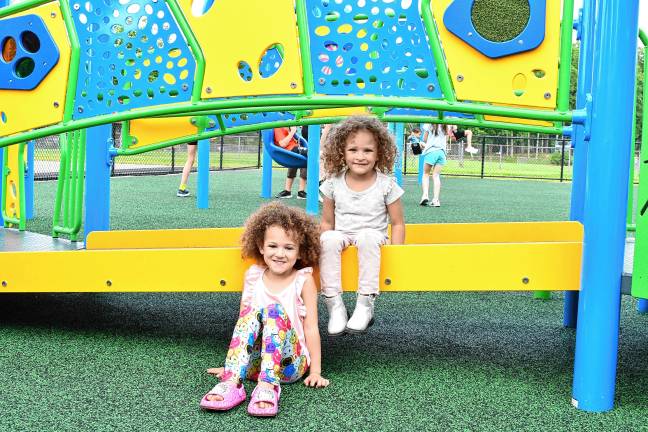 Inclusive playground opens Annaleah and Charlotee Burke. (Photo by Maria Kovic)