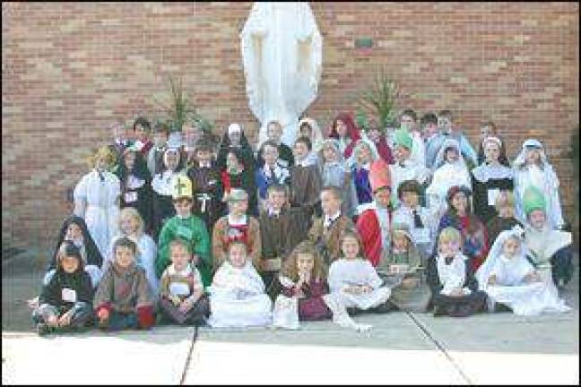 Saints visit Reverend Brown School Saints visit Reverend Brown School