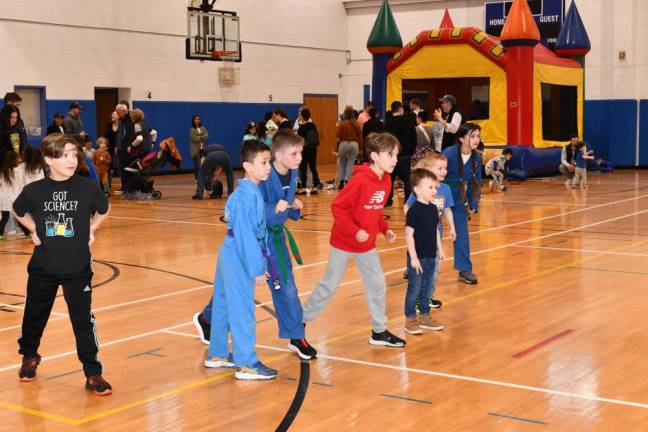 Boys prepare to run a race during the Sparta Winter Carnival on Saturday, Feb. 10 at Sparta Middle School. The event, sponsored by the Sparta Parks &amp; Recreation Department, included a bounce house, GaGa Pit, sand art, face painting, a magic show, and dance and martial arts demonstrations. (Photos by Maria Kovic)