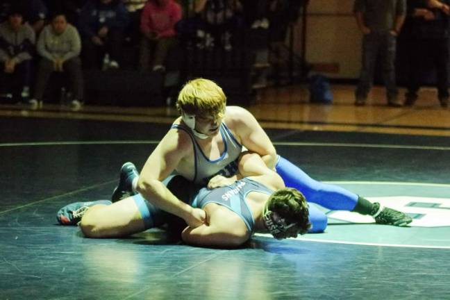 Kittatinny’s Tucker Lockburner, top, grapples with Sparta’s Connor White in the 285-pound weight class. Lockburner won by decision, 3-1, on Friday, Jan. 26.