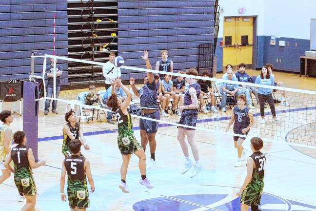 Sports roundup: Pope John wins H/W/S title The J.P. Stevens Hawks battle the Spartans.