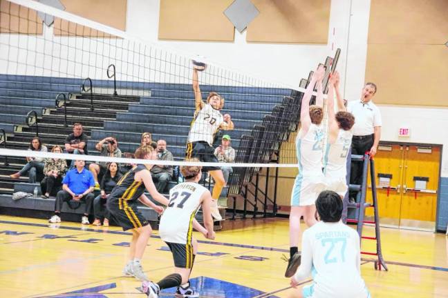 Jefferson's Kyle Kepler strikes the ball. He was credited with two kills, five digs and two aces.