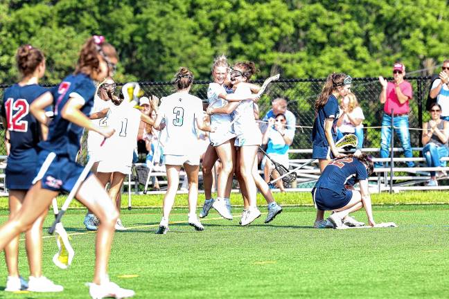 Photos: Spartans in Group 2 final Spartans celebrate as time expires in their 8-4 win in Mendham.