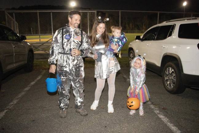 James and Lauren Seck pose with their children Jamie, 1, and Lana, 3.