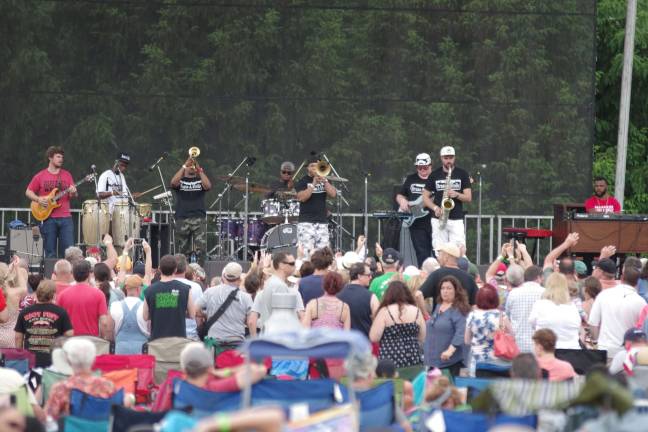 Crawfish fest goes 'down home' The Brass-A-Holics get the crowd on its feet.