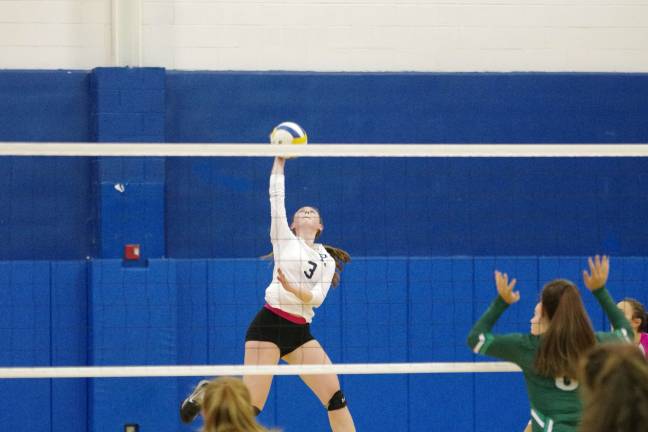 Montville tops Pope John in volleyball Pope John's Madison Doherty reaches for the ball. Doherty contributed three aces, five service points, five kills, one block and ten digs. Photos by George Leroy Hunter
