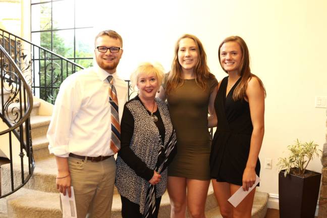 Sparta seniors receive scholarships Greg Holowach Memorial Scholarship - Daniel Baker, Lorna Holowach, April VanNieuwland, Hailey Mead