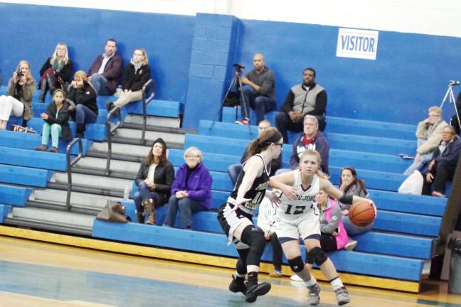 Pope John girls beat Paramus Catholic in basketball quarter-finals Pope John's Alyssa Aragona dribbles the ball while being covered by Paramus' Natalie Stanton.