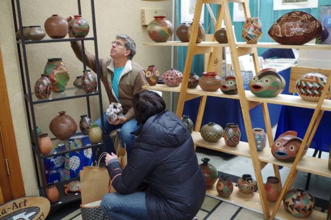 Springfest returns to county fairgrounds Chris Welke of Nicaragua-based "Nica-Art" Pottery represents dozens of Central American potters and brings their work to the United States for sale.