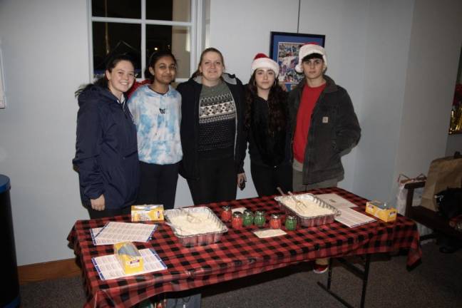 Volunteers at the reindeer food table.