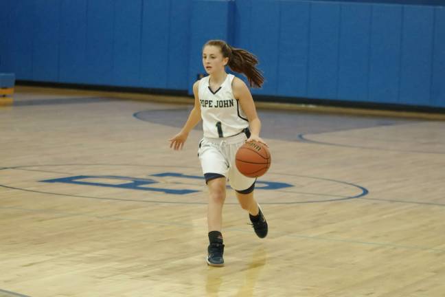 Hudson Catholic beats Pope John in girls hoops Pope John's Carly Fitzmorris dribbles the ball. Fitzmorris grabbed three rebounds.