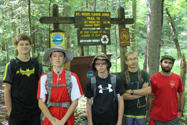 Sparta scouts take canoe journey At trailhead. From left, Thomas Schwarzrock, Robert Hartranft, Jay Suter, John Bollard, Voyageur Jacob Keenan