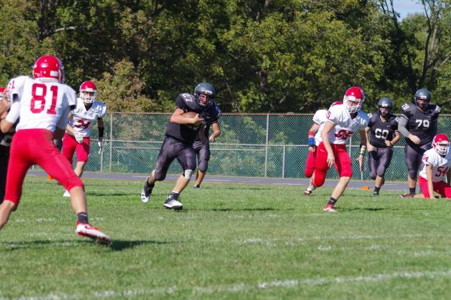 Lenape Valley smothers Wallkill in high school football Wallkill Valley running back Dylan Harlos advances the ball through an opening in the Lenape Valley defense. POhotos by George Leroy Hunter
