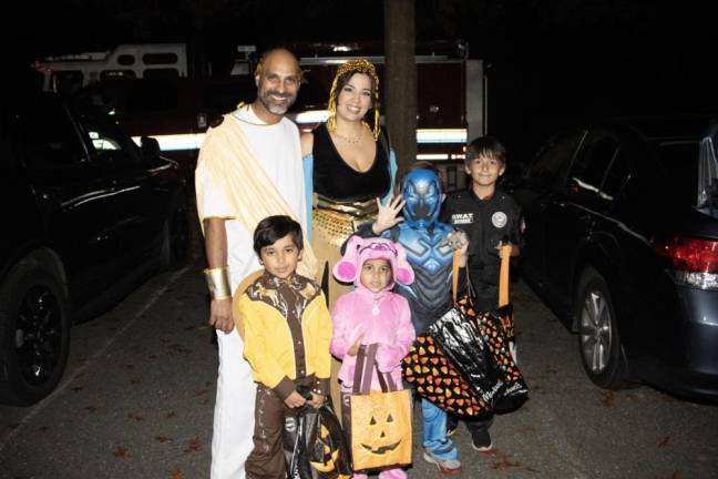 Rinaldo and Julie Torres brought their children to the Trunk or Treat.