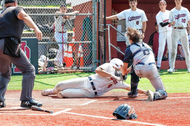 Photos: Pope John in baseball finals Pope John catcher Andrew Pami tags out Alex Hriczov at home while he was trying to score Morristown-Beard’s first run.