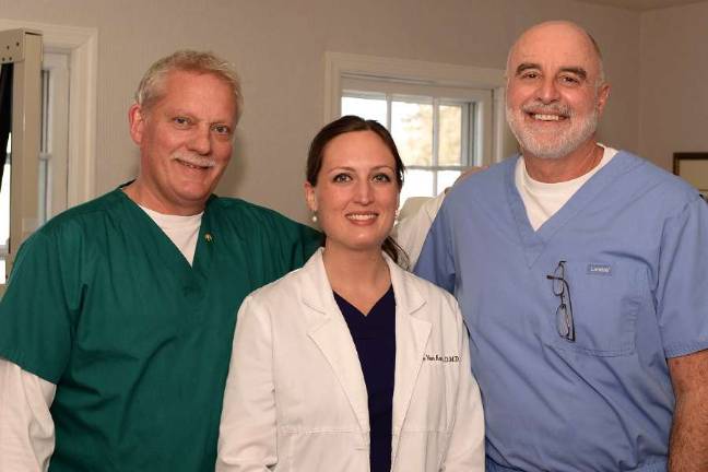 Dentist office to offer free care Drs. Fred Van Keuren, Paige Van Keuren and Charles Becker are pictured.