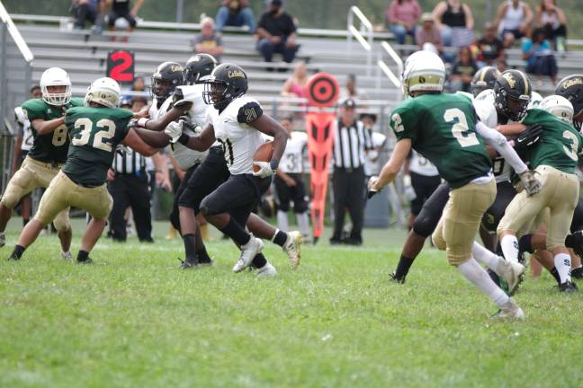 Hudson Catholic crushes Sussex Tech In the third quarter Hudson Catholic running back Jalen Best advances the ball up the middle.