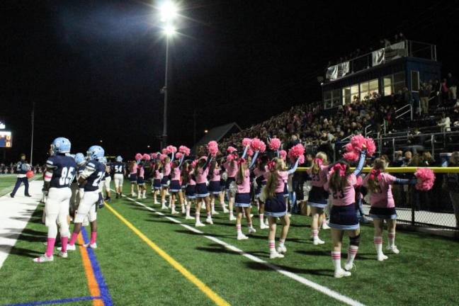 Sparta cheer works up the crowd's enthusiasm.