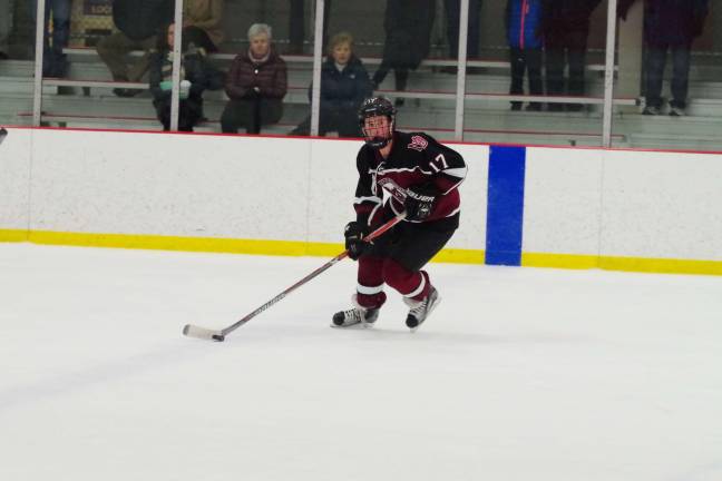 Pope John's beats Morristown-Beard on the ice Morristown-Beard's Jake Kurz steers the puck.