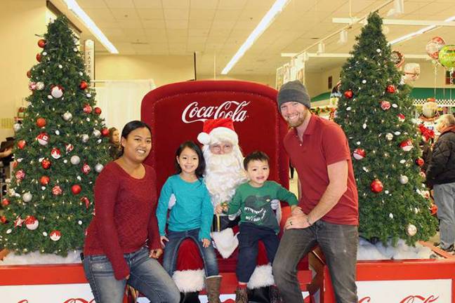 Santa comes to Stanhope Melissa Stevens, Rhiley Stevens-Hopkins, William Hopkins III, and Will Hopkins Jr. (Landing)